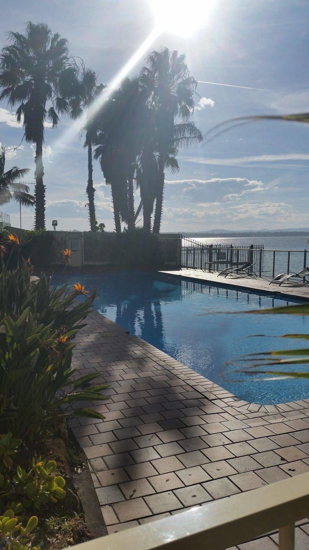 The Beachcomber Hotel & Resort, Ascend Hotel Collection Toukley Exterior foto View of the pool at the hotel